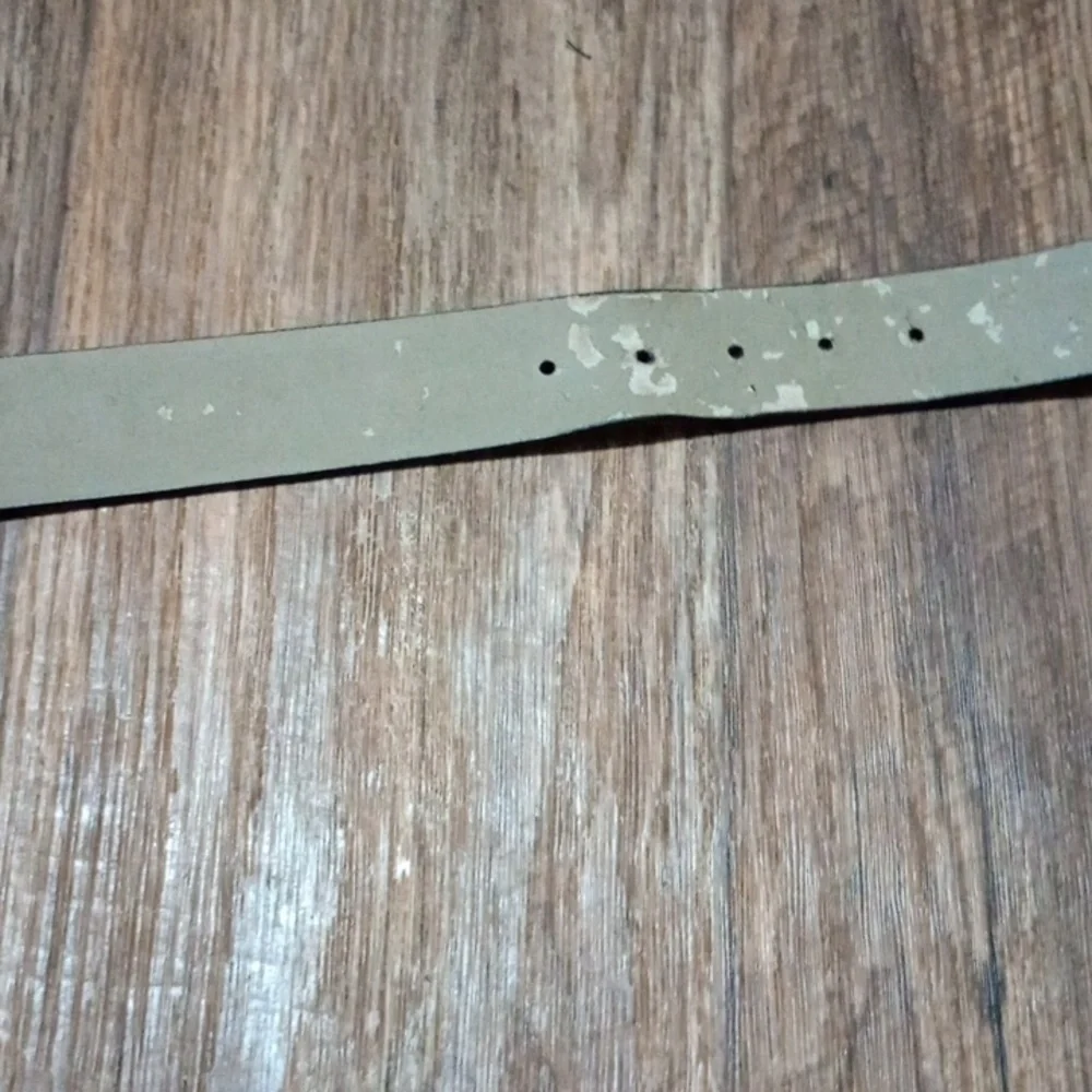 Talbots black leather belt has black & gold buckle  can be worn for any occasion